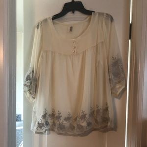 Cream blouse with grey lace accent